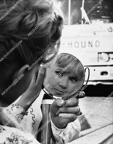 Connie Stevens does a quick makeup check 2704-34