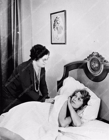 grumpy Jeanette MacDonald in bed film scene 2909b-05