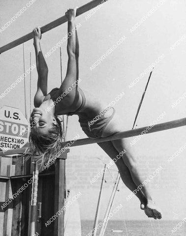 2959-024 stunning Sharon Tate in bikini on the balance bars 2959-024