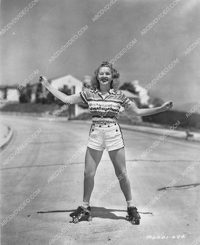 athletic Betty Grable goes roller skating for some fun 3030-16