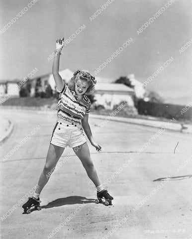 athletic Betty Grable goes roller skating for some fun 3030-20