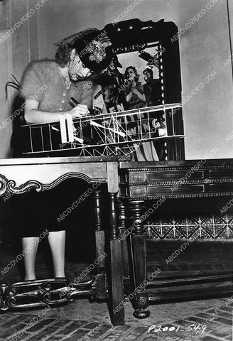 cool Betty Grable working on her model airplane 3031-19