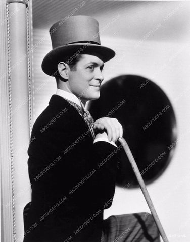 Robert Montgomery in top hat film But the Flesh Is Weak 3164-09