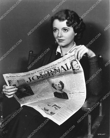great candid Janet Gaynor on set reading The Milwaukee Journal 3417-03