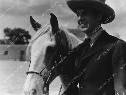 Fred MacMurray and his horse film The Texas Rangers 3497-09