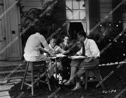 Allan Dwan w the camera department going over notes 3517-34