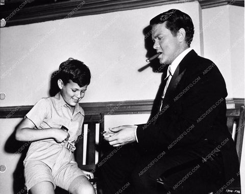 Orson Welles doing magic behind the scenes Follow the Boys 3573-23