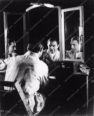 Bela Lugosi candid doing makeup for Dracula 3590-16