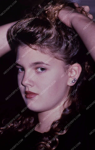 Drew Barrymore holding up her hair 35m-743