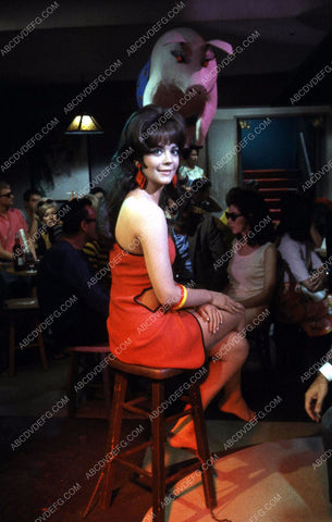 beautiful Natalie Wood sitting on a barstool 35m-13138