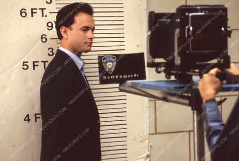 Tom Hanks posing for a mugshot film The Bonfire of the Vanities 35m-13913