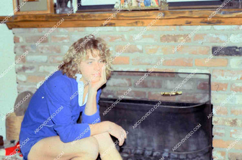 Leif Garrett sitting by the fireplace at Christmas time 35m-14268