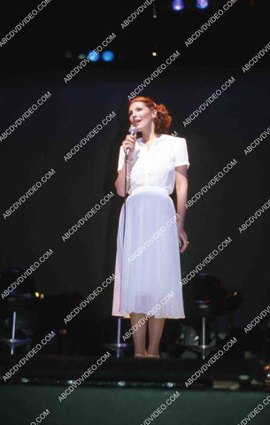 Eileen Barnett singing and doing standup on stage 35m-15203