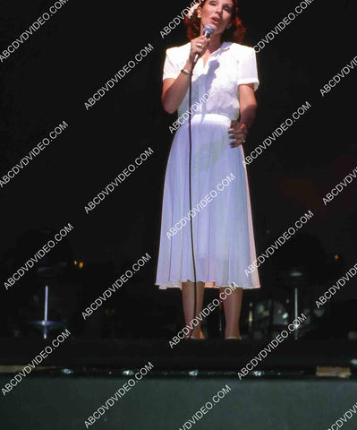 Eileen Barnett singing and doing standup on stage 35m-15205