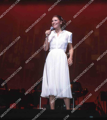 Eileen Barnett singing and doing standup on stage 35m-15207