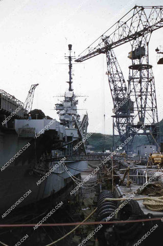 circa 1956 U.S. Naval shipyard Subic Bay Philippines aircraft carrier USS Shangri-La in dry dock 35m-16301