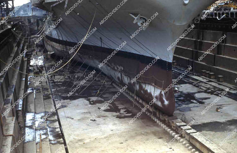 circa 1956 U.S. Naval shipyard Subic Bay Philippines aircraft carrier USS Shangri-La in dry dock 35m-16340