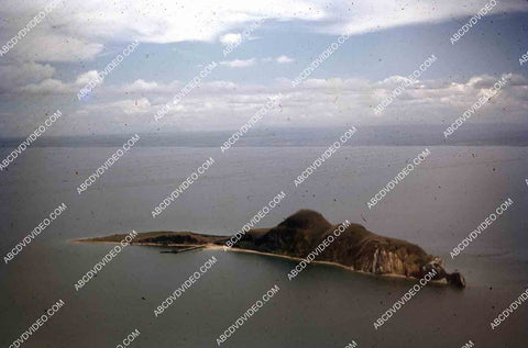 circa 1956 U.S. sailor tours historic Philippines from air in twin engine air force plane 35m-16347