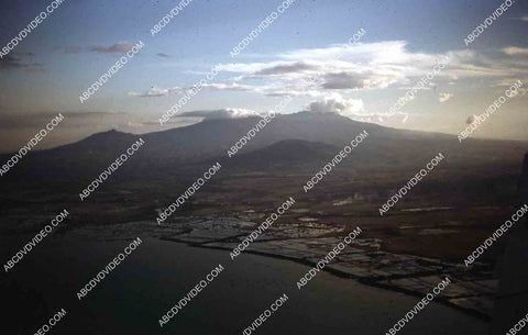 circa 1956 U.S. sailor tours historic Philippines from air in twin engine air force plane 35m-16348