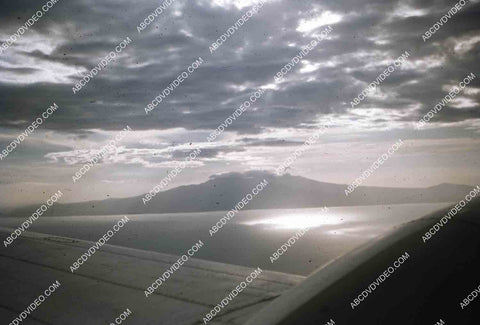 circa 1956 U.S. sailor tours historic Philippines from air in twin engine air force plane 35m-16349