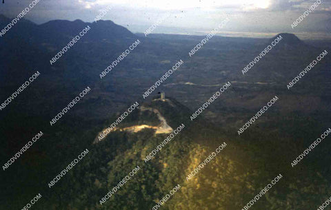 circa 1956 U.S. sailor tours historic Philippines from air in twin engine air force plane 35m-16356