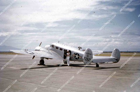 circa 1956 U.S. sailor tours historic Philippines from air in twin engine air force plane 35m-16401