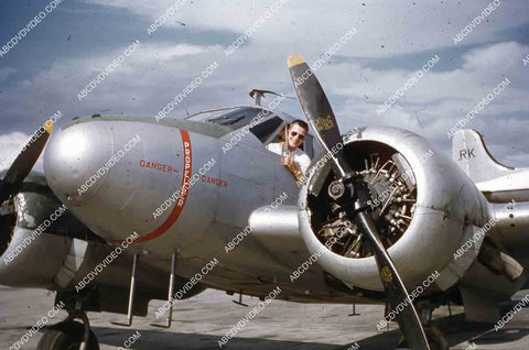 circa 1956 U.S. sailor tours historic Philippines from air in twin engine air force plane 35m-16402
