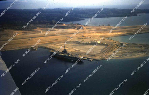 circa 1956 U.S. sailor tours historic Philippines from air USS Shangri-La in Subic Bay 35m-16407