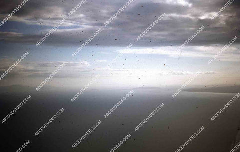 circa 1956 U.S. sailor tours historic Philippines from air in twin engine air force plane 35m-16409