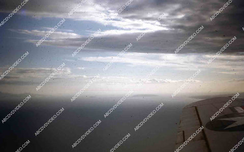 circa 1956 U.S. sailor tours historic Philippines from air in twin engine air force plane 35m-16410
