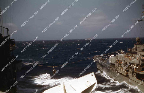circa 1956 U.S. Naval support vessels viewed from deck aircraft carrier USS Shangri-La 35m-16445