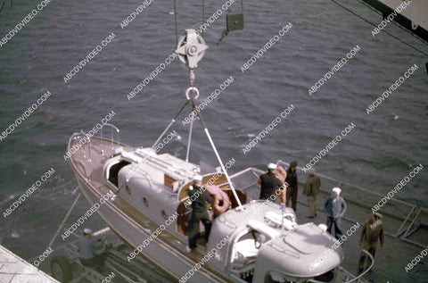 circa 1956 U.S. Naval operations USS Shangri-La raising launch to load up 35m-16588