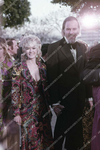 Connie Stevens and date arrive at some awards ceremony 35m-17023