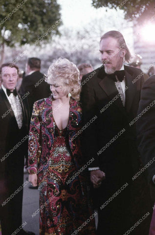 Connie Stevens and date arrive at some awards ceremony 35m-17024