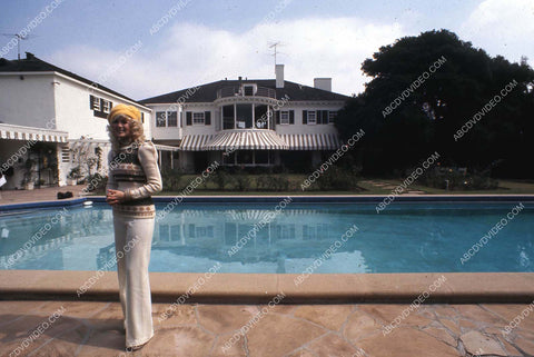 Connie Stevens in backyard by the swimming pool 35m-17027