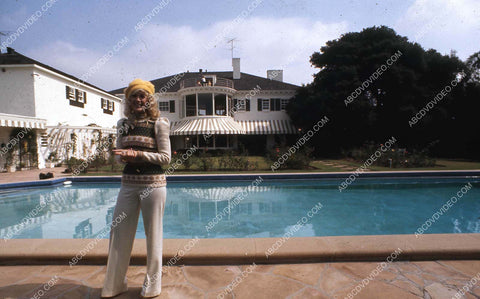Connie Stevens in backyard by the swimming pool 35m-17028
