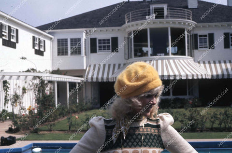 Connie Stevens in backyard by the swimming pool 35m-17029