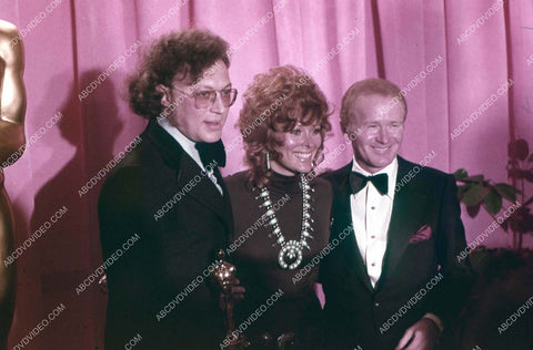 Gerald Greenberg Jill St. John Red Buttons on stage Academy Awards 35m-17316