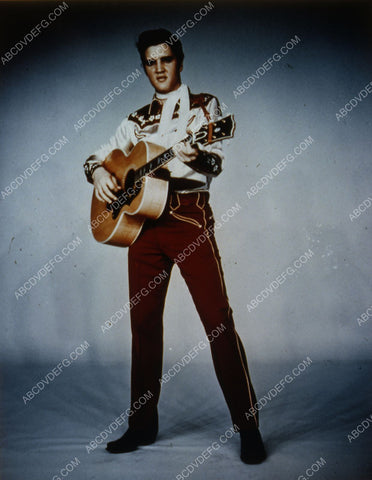 Elvis Presley and his guitar 35m-1997