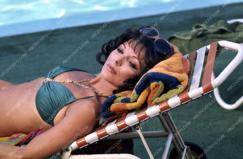 sexy Joan Collins sunbathing in her bikini 35m-2266