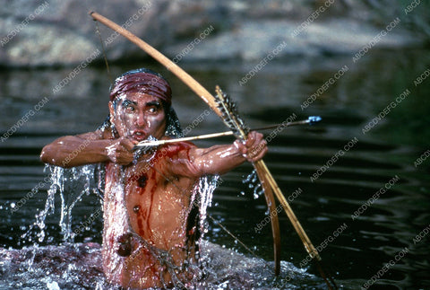 Joseph Runningfox w bow and arrow TVM Geronimo 35m-3495