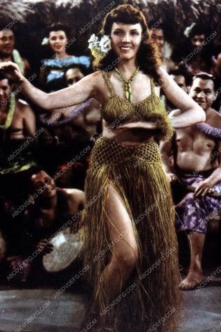 Margie Hart doing a hula dance in her grass skirt 35m-4999