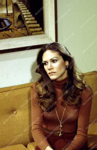 Pamela Hensley sitting on the couch 35m-5146