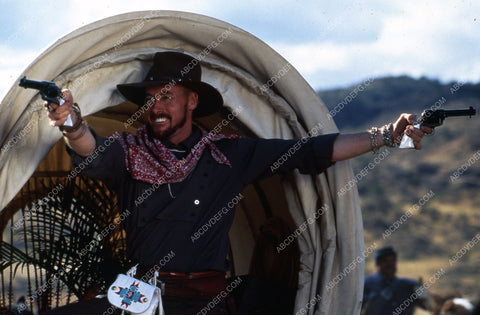 John C McGinley with six shooters film Wagons East 35m-6815