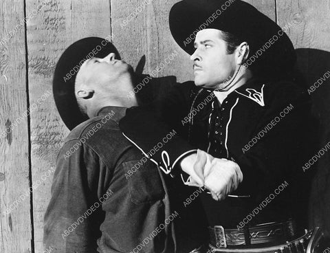 Duncan Renaldo punching the bad guy film Cowboys from Texas 3770-16