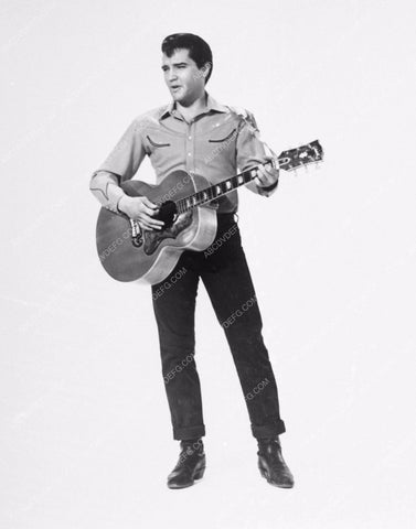 Elvis Presley and a guitar 4297-25