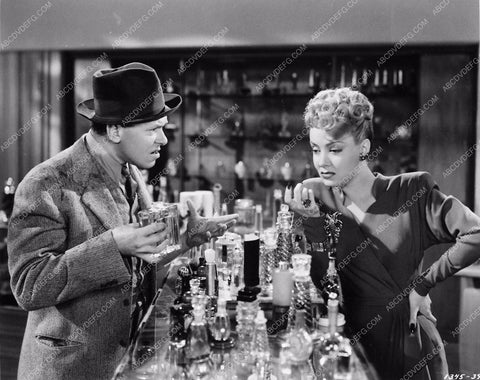 Audrey Totter at the perfume counter mystery film Dangerous Partners 4395-02