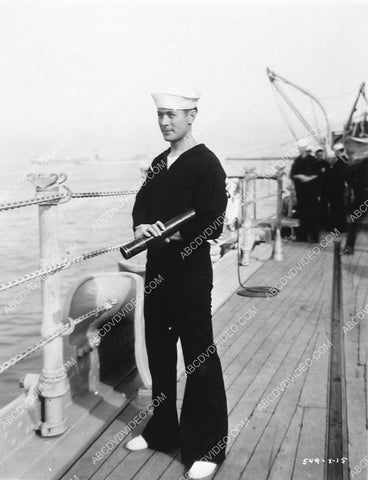 Robert Montgomery on ship deck w telescope 4472-27