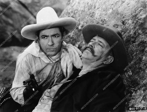 Johnny Mack Brown helps a friend in Wild West Days serial 4481-16