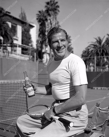 athletic Don Terry enjoys pepsi on the tennis court 45bx05-70